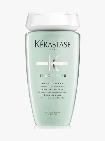 Kérastase Specifique Bain Divalent Shampoo in branded component on a light gray background
